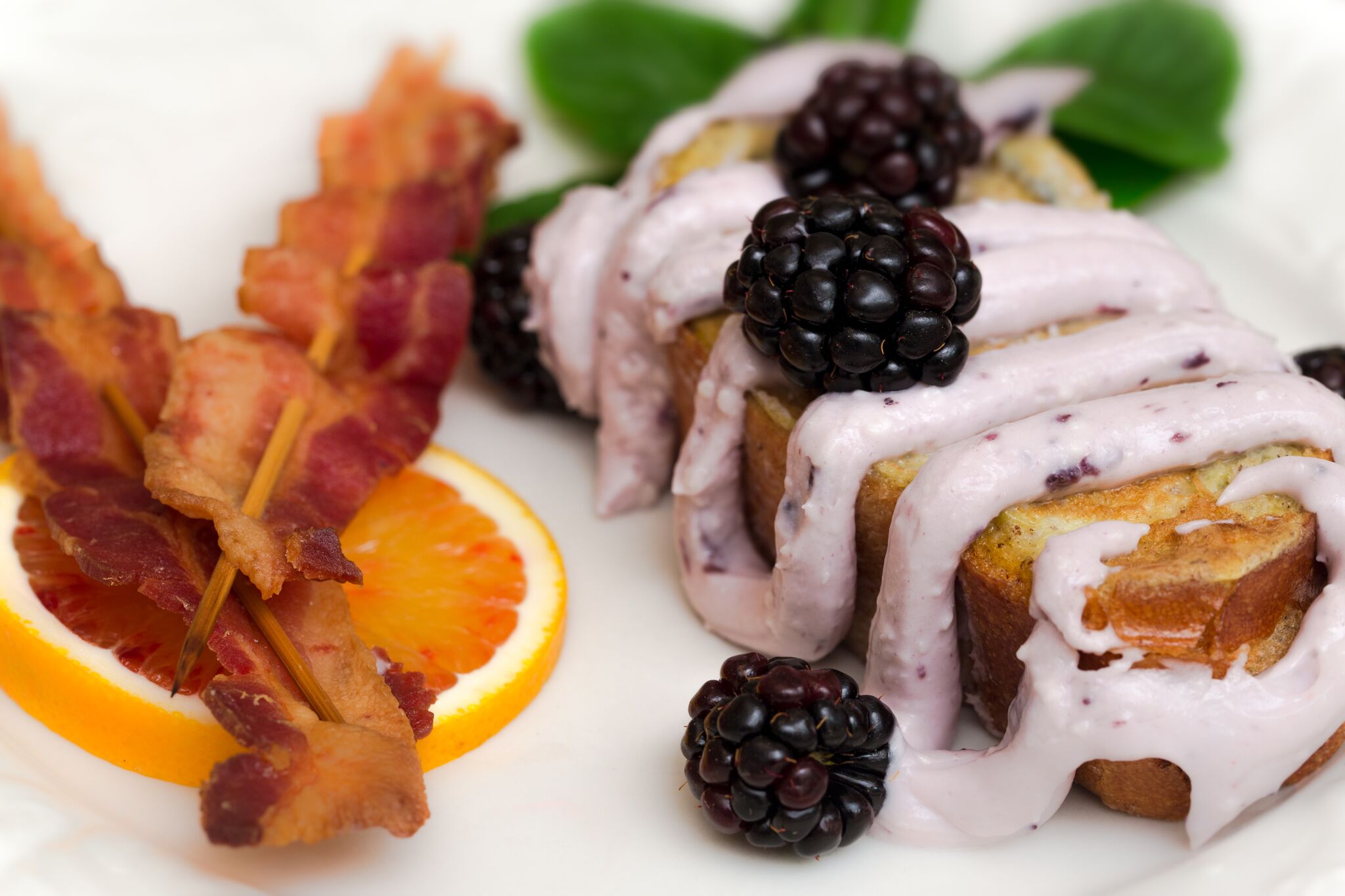 Photo of French Toast with Blueberry Cream Cheese Sauce and Bacon on side